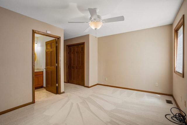 2946 County Road 800 E, Dewey, IL 61840 - spare room with light carpet, baseboards, and a ceiling fan
