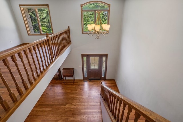 2946 County Road 800 E, Dewey, IL 61840 - entryway with a chandelier, wood finished floors, and a towering ceiling