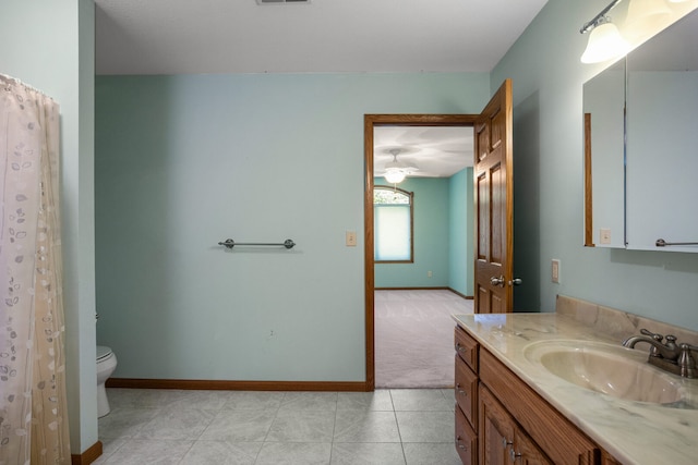 2946 County Road 800 E, Dewey, IL 61840 - bathroom featuring toilet, vanity, baseboards, and tile patterned floors