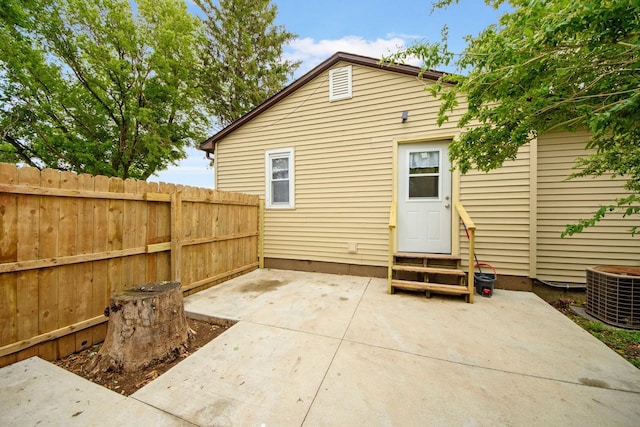 2725 2100n Rd, Minonk, IL 61760 - rear view of property featuring entry steps, a patio area, and central AC unit
