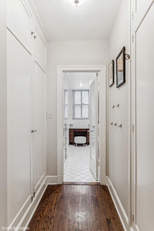 1320 N State Pkwy Unit 2A, Chicago, IL 60610 - corridor featuring baseboards and wood finished floors