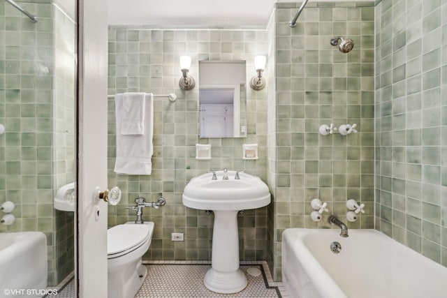 1320 N State Pkwy Unit 2A, Chicago, IL 60610 - bathroom featuring tile walls, a bath, tile patterned floors, toilet, and a shower