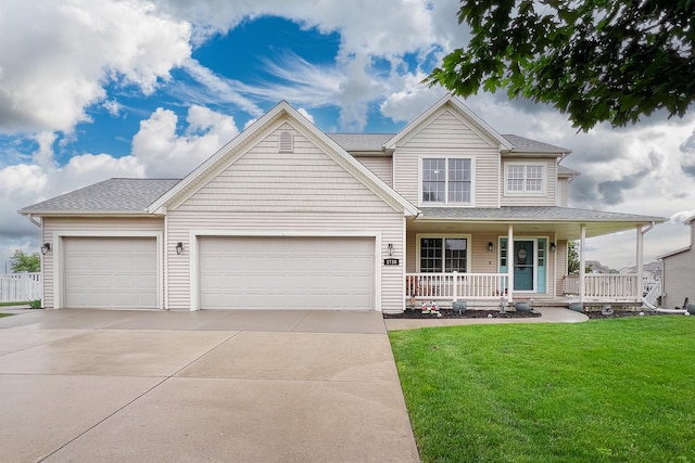 2738 Wharton Way, Normal, IL 61761 - view of front of home featuring driveway, covered porch, a front lawn, and a garage