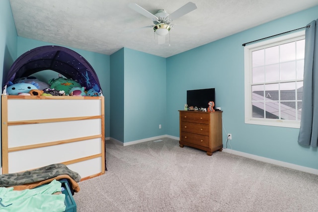 2738 Wharton Way, Normal, IL 61761 - carpeted bedroom featuring baseboards, ceiling fan, and a textured ceiling