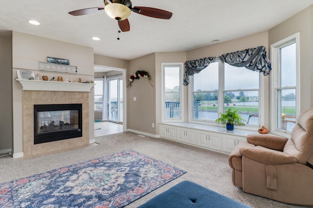 2738 Wharton Way, Normal, IL 61761 - living area with carpet floors, ceiling fan, baseboards, a fireplace, and recessed lighting