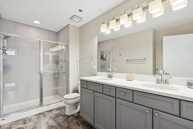 849 N Franklin St Unit 618, Chicago, IL 60610 - full bath featuring toilet, a stall shower, and double vanity