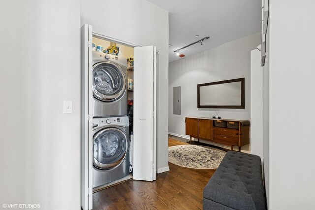 849 N Franklin St Unit 618, Chicago, IL 60610 - washroom with stacked washer / drying machine, wood finished floors, and electric panel