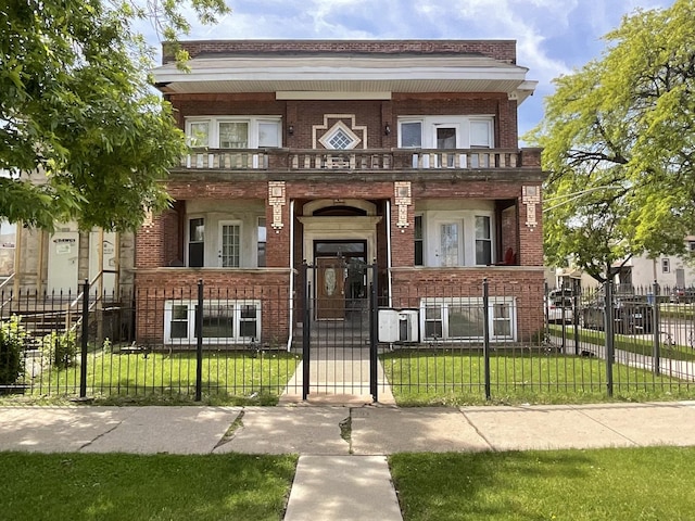 143 E 111th St, Chicago, IL 60628 - view of front of house featuring a balcony, brick siding, a gate, and a porch