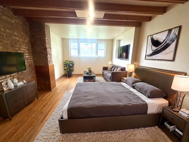 143 E 111th St, Chicago, IL 60628 - bedroom featuring beamed ceiling and light wood-style flooring