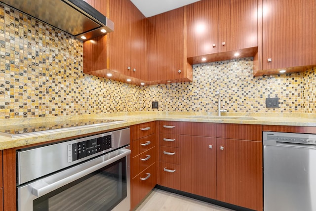 1450 N Astor St Unit 7D, Chicago, IL 60610 - kitchen featuring appliances with stainless steel finishes, a sink, range hood, and backsplash