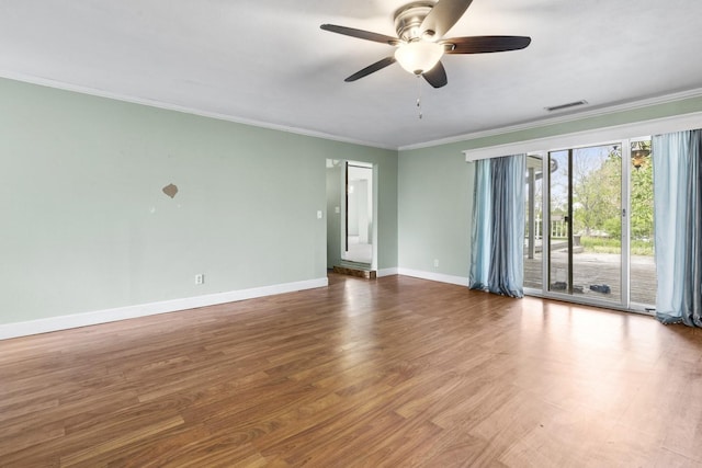 8530 N Kishwaukee Rd, Stillman Valley, IL 61084 - unfurnished room featuring ornamental molding, a ceiling fan, baseboards, and wood finished floors