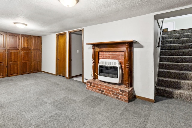 8530 N Kishwaukee Rd, Stillman Valley, IL 61084 - unfurnished living room with heating unit, a textured ceiling, stairs, carpet floors, and baseboards