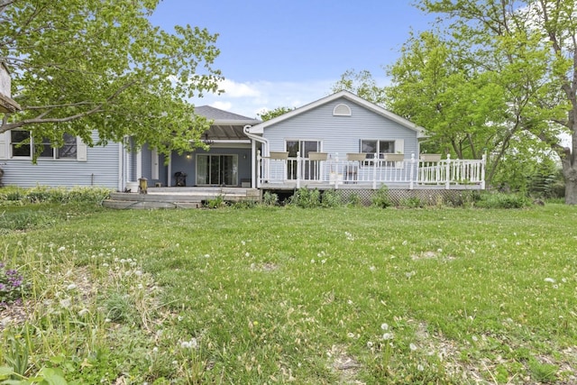 8530 N Kishwaukee Rd, Stillman Valley, IL 61084 - back of property with a wooden deck and a yard