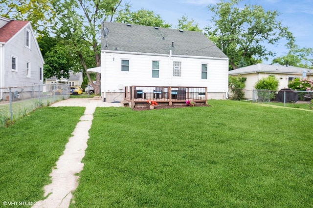 430 S Tanner Ave, Kankakee, IL 60901 - rear view of property featuring a wooden deck and a shingled roof