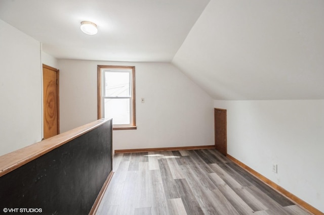 430 S Tanner Ave, Kankakee, IL 60901 - bonus room with light wood-type flooring, vaulted ceiling, and baseboards
