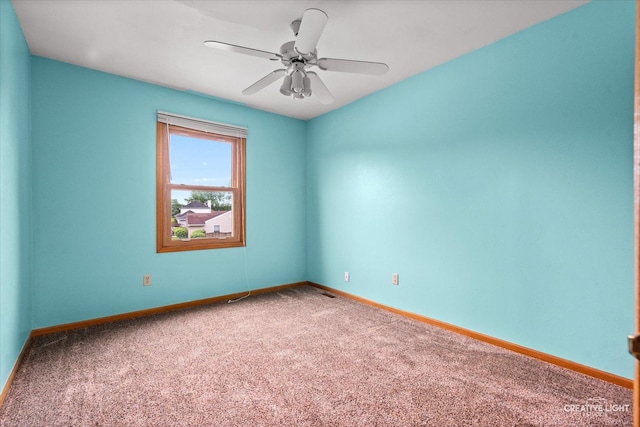 916 Shady Ln, Aurora, IL 60506 - empty room with carpet, baseboards, and ceiling fan