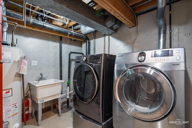 916 Shady Ln, Aurora, IL 60506 - laundry room with water heater and separate washer and dryer