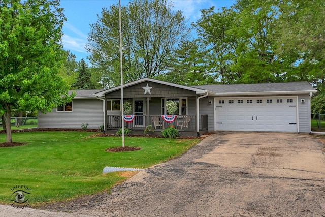 23246 S Malibu Dr, Manhattan, IL 60442 - single story home featuring covered porch, a garage, and driveway