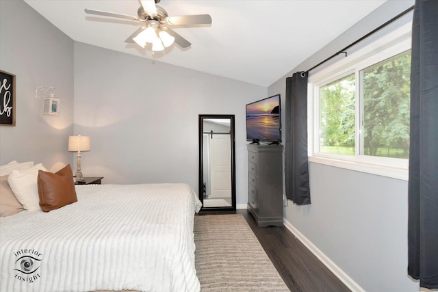 23246 S Malibu Dr, Manhattan, IL 60442 - bedroom with vaulted ceiling, dark wood-style flooring, baseboards, and a ceiling fan