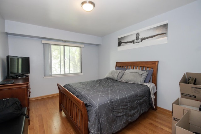 3150 W Bryn Mawr Ave Unit 301, Chicago, IL 60659 - bedroom with wood finished floors and baseboards