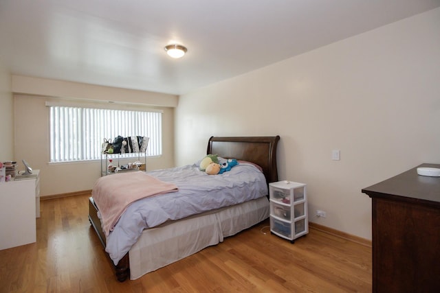 3150 W Bryn Mawr Ave Unit 301, Chicago, IL 60659 - bedroom with light wood finished floors and baseboards