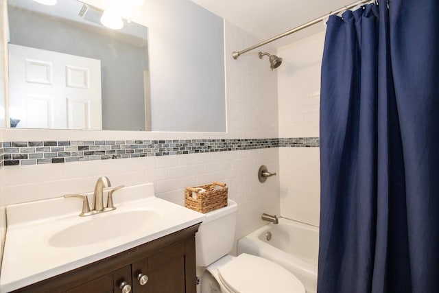 3150 W Bryn Mawr Ave Unit 301, Chicago, IL 60659 - bathroom featuring shower / tub combo, vanity, toilet, and decorative backsplash