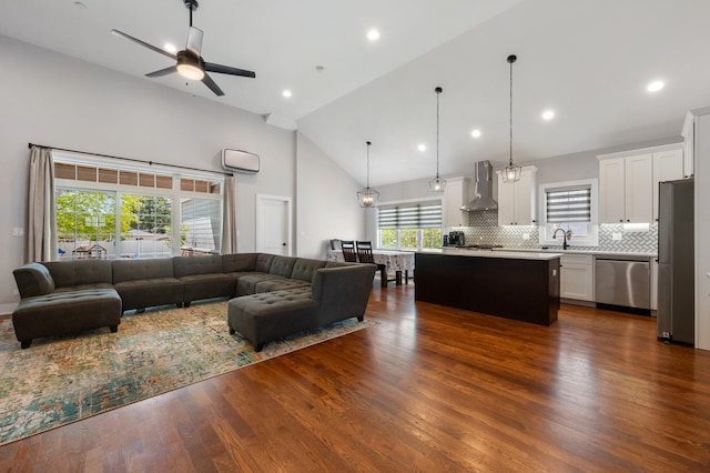 8029 98th St, Palos Hills, IL 60465 - living area with a ceiling fan, high vaulted ceiling, dark wood-style floors, recessed lighting, and a wall mounted air conditioner