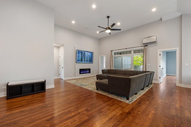 8029 98th St, Palos Hills, IL 60465 - living area featuring a towering ceiling, a ceiling fan, baseboards, wood finished floors, and recessed lighting