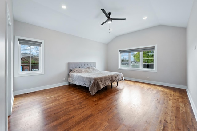 8029 98th St, Palos Hills, IL 60465 - bedroom featuring multiple windows, wood finished floors, lofted ceiling, baseboards, and recessed lighting