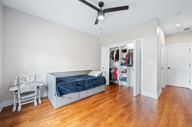 8029 98th St, Palos Hills, IL 60465 - bedroom with light wood-type flooring, baseboards, a ceiling fan, and a closet