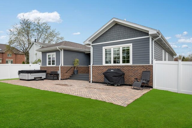 8029 98th St, Palos Hills, IL 60465 - rear view of property with a hot tub, brick siding, and a patio