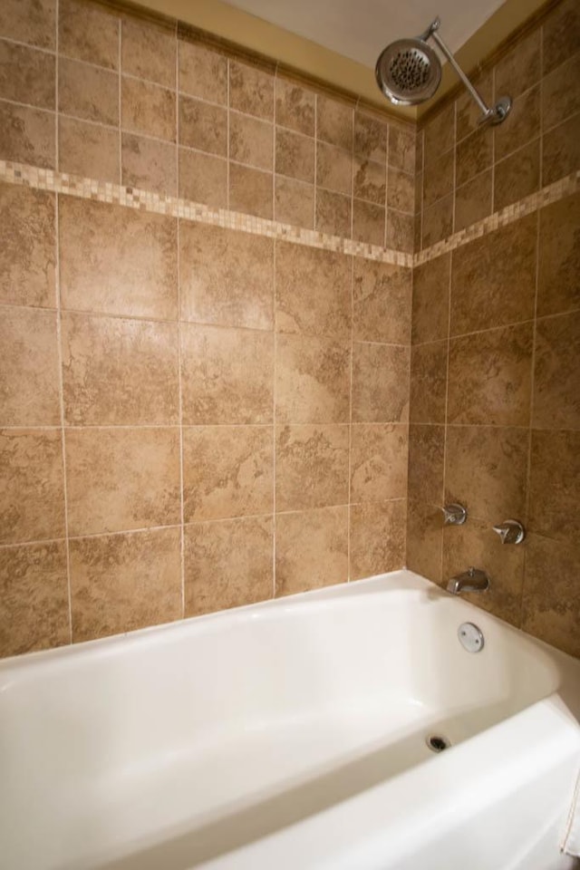 full bathroom featuring washtub / shower combination