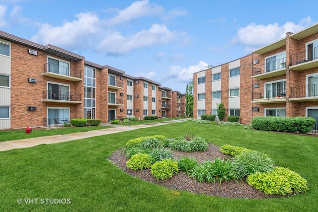 4137 W 97th Pl Unit 311, Oak Lawn, IL 60453 - view of home's community featuring a lawn