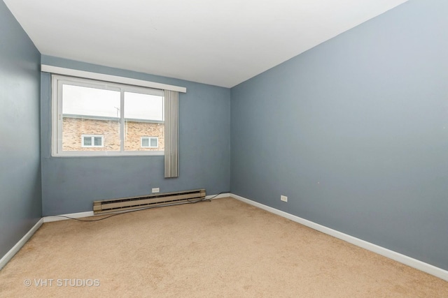 4137 W 97th Pl Unit 311, Oak Lawn, IL 60453 - carpeted empty room with a baseboard heating unit and baseboards