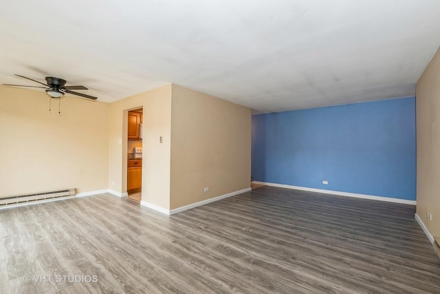 4137 W 97th Pl Unit 311, Oak Lawn, IL 60453 - empty room featuring a ceiling fan, wood finished floors, baseboards, and baseboard heating
