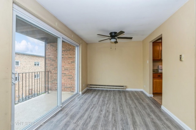 4137 W 97th Pl Unit 311, Oak Lawn, IL 60453 - unfurnished sunroom with baseboard heating