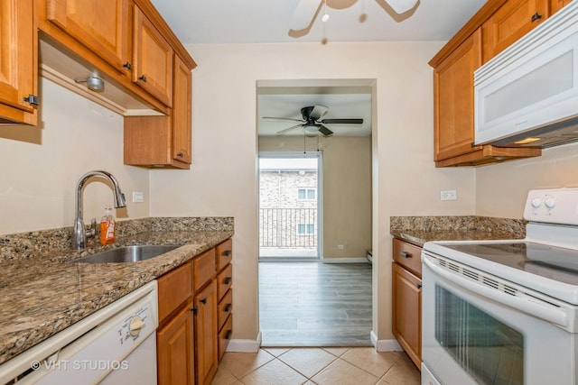 4137 W 97th Pl Unit 311, Oak Lawn, IL 60453 - kitchen with white appliances, ceiling fan, a sink, and brown cabinetry