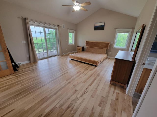 7648 N Indian Ridge Rd, East Dubuque, IL 61025 - unfurnished bedroom with access to outside, light wood-style floors, lofted ceiling, baseboards, and ceiling fan