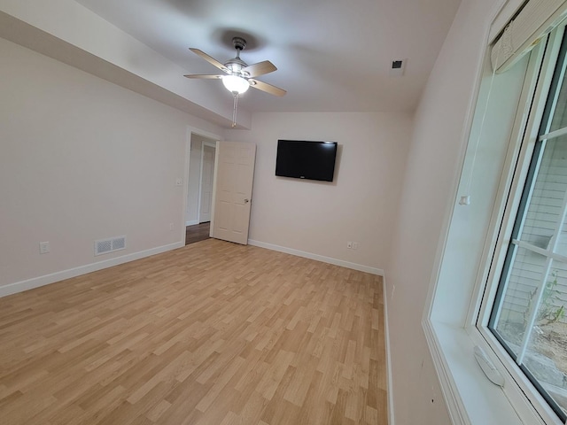 7648 N Indian Ridge Rd, East Dubuque, IL 61025 - spare room featuring light wood finished floors, ceiling fan, and baseboards