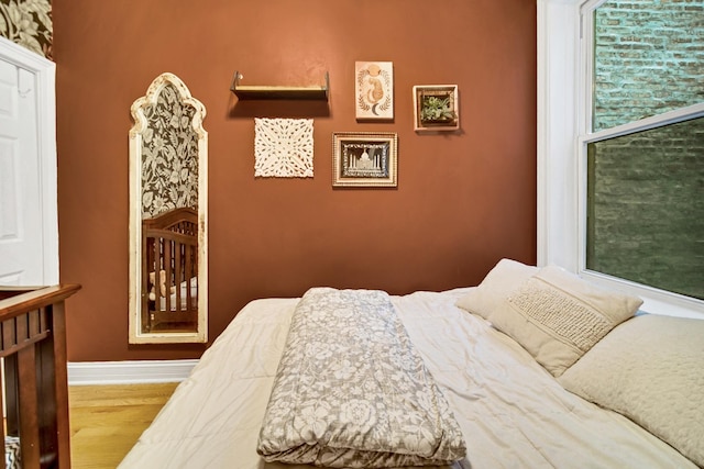 838 N Maplewood Ave Unit 1R, Chicago, IL 60622 - bedroom with baseboards and wood finished floors