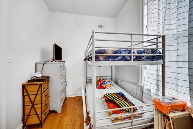 838 N Maplewood Ave Unit 1R, Chicago, IL 60622 - bedroom featuring wood finished floors and baseboards