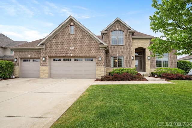 4336 Winterberry Ave, Naperville, IL 60564 - traditional-style house featuring a garage, stone siding, concrete driveway, and a front yard