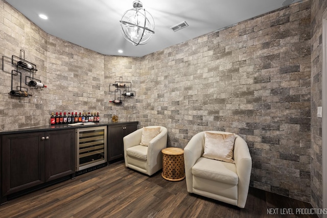 4336 Winterberry Ave, Naperville, IL 60564 - wine room featuring beverage cooler, a dry bar, dark wood-type flooring, brick wall, and recessed lighting