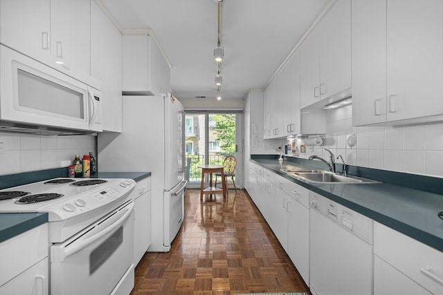 140 Franklin Pl Unit 106, Lake Forest, IL 60045 - kitchen with white appliances, a sink, white cabinetry, tasteful backsplash, and dark countertops