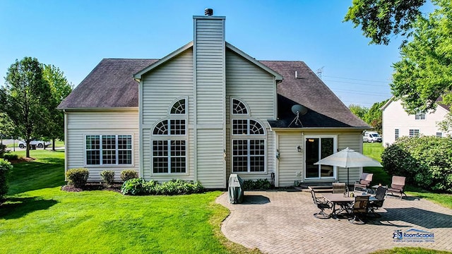 532 Nunda Trl, Crystal Lake, IL 60012 - rear view of house featuring a patio, a lawn, a chimney, and a shingled roof