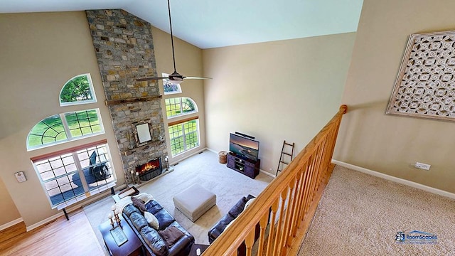 532 Nunda Trl, Crystal Lake, IL 60012 - living area featuring a fireplace, baseboards, high vaulted ceiling, and a ceiling fan
