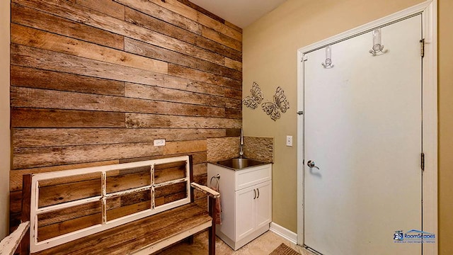532 Nunda Trl, Crystal Lake, IL 60012 - laundry area with wooden walls and light tile patterned floors