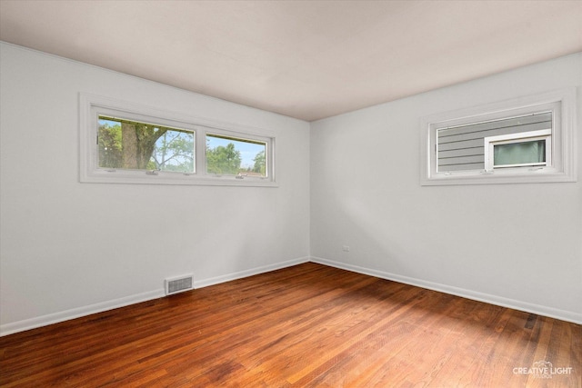 521 Division St, Saint Charles, IL 60174 - spare room with wood finished floors and baseboards