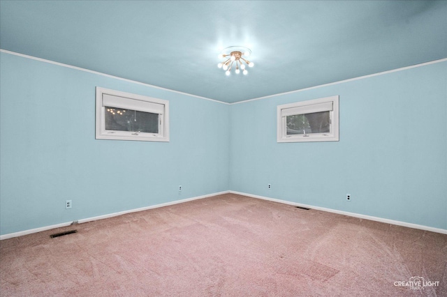 521 Division St, Saint Charles, IL 60174 - carpeted empty room featuring crown molding and baseboards