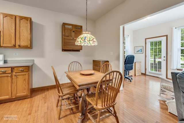 507 Parkland Ct, Oswego, IL 60543 - dining area featuring light wood-style floors and baseboards